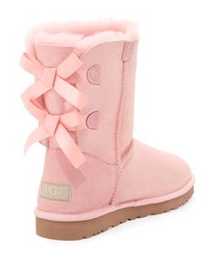 Ljusrosa UGG:s med rosetter