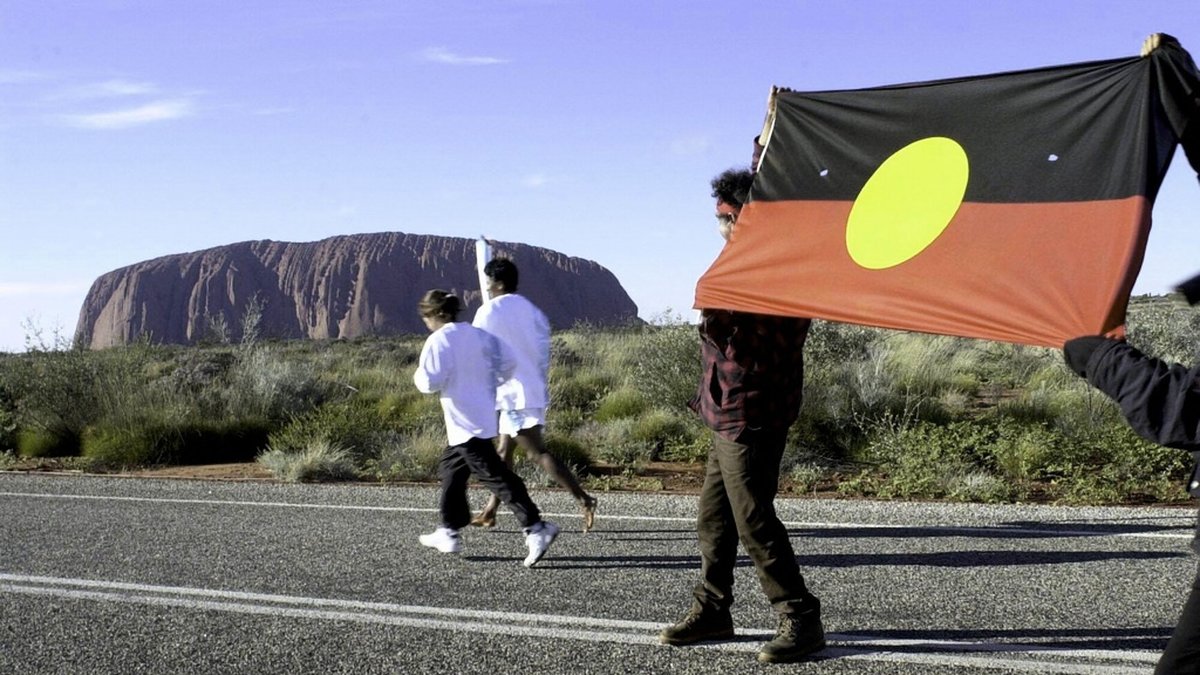 Aboriginernas flagga i Australien är inte längre upphovsrättsskyddad. Arkivbild
