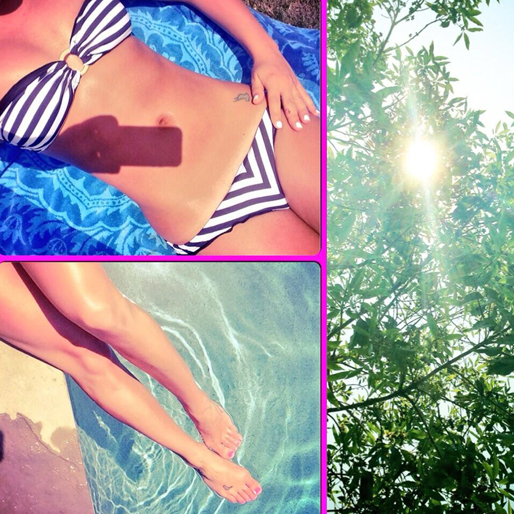 Lea Michele från teveserien Glee solar vid poolen. Lea Michele från teveserien Glee solar vid poolen.
