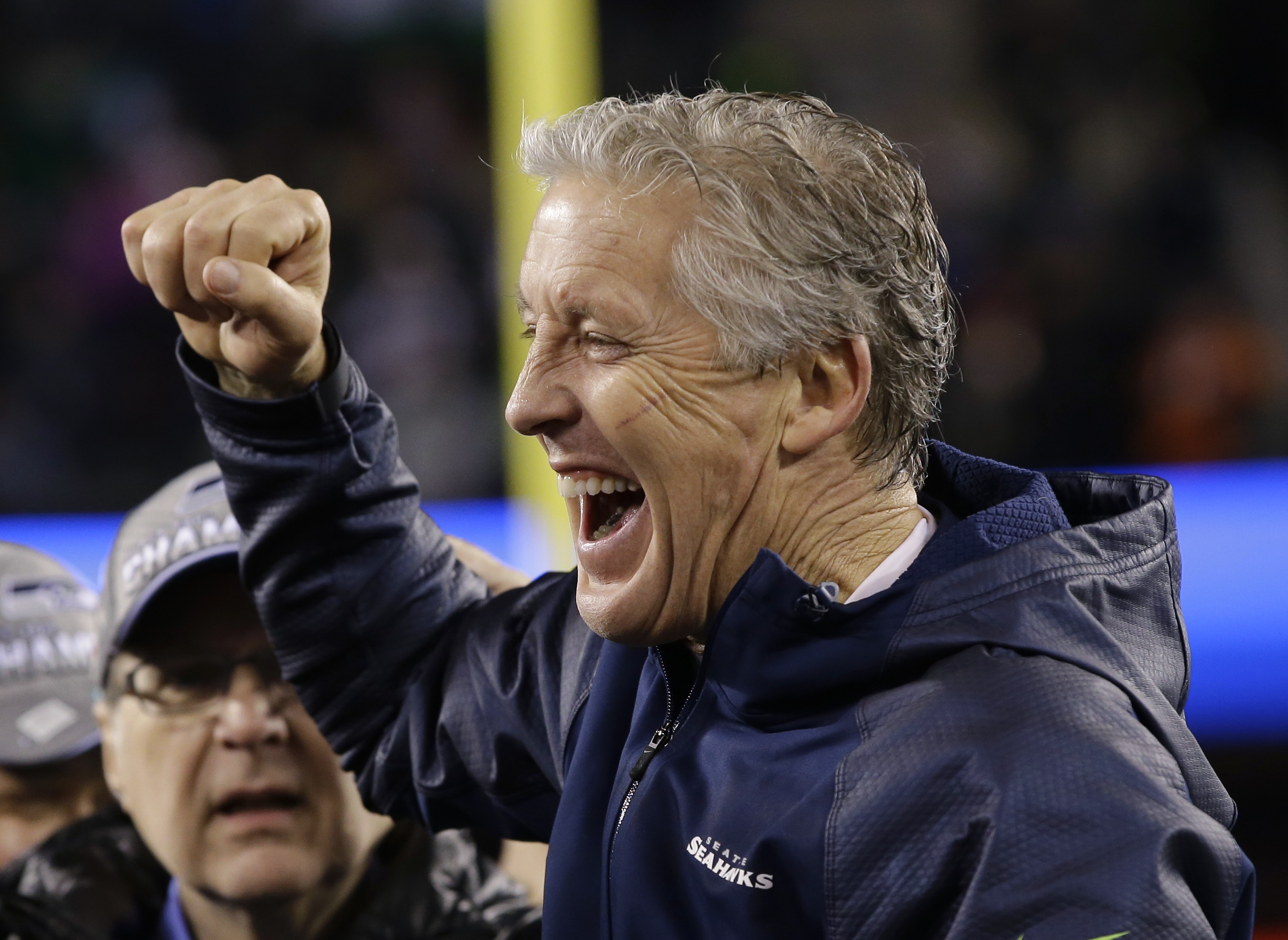 Tränaren Pete Carroll firar sin och Seattle Seahawks första Super Bowl-titel. Tränaren Pete Carroll firar sin och Seattle Seahawks första Super Bowl-titel.