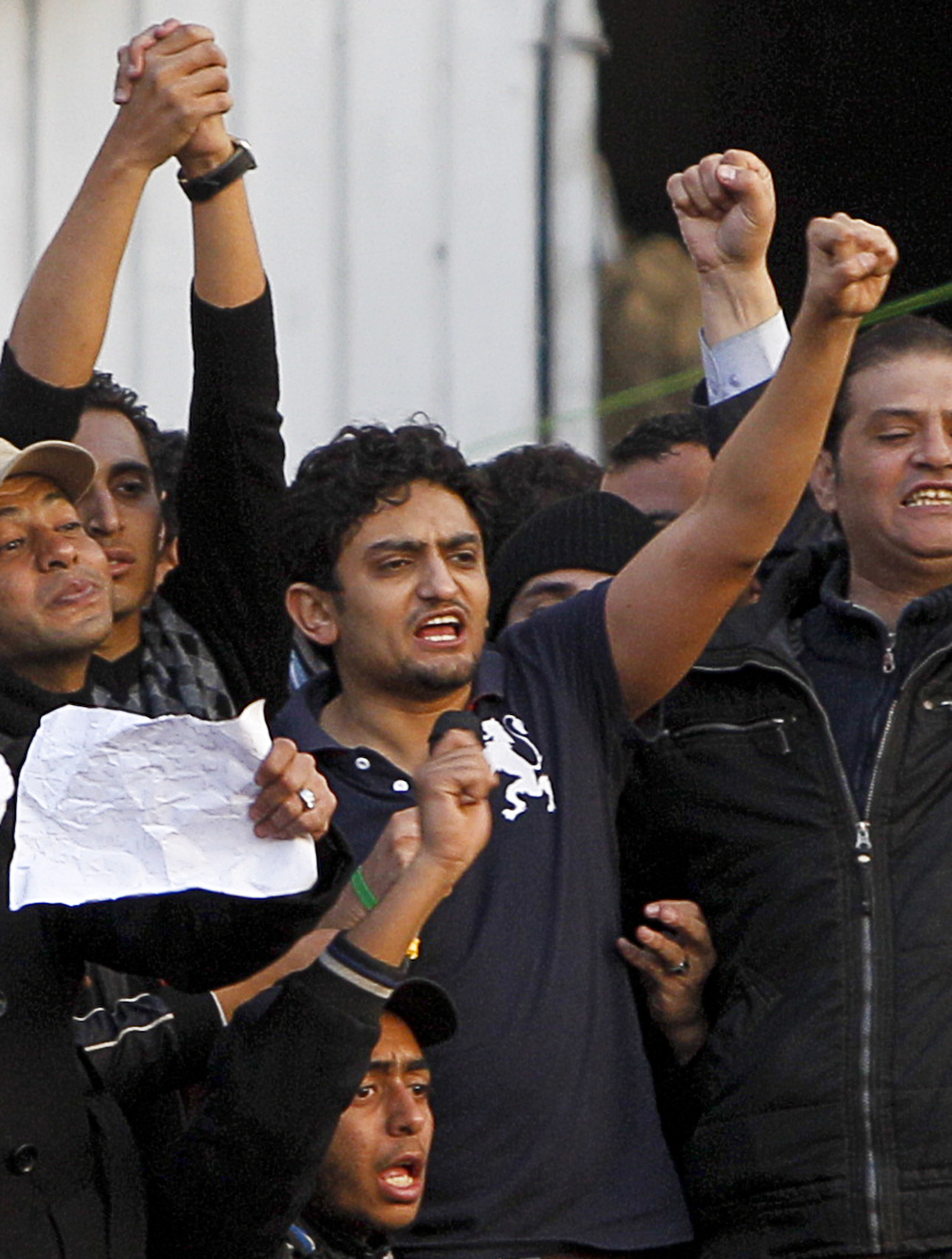 Wael Ghonim (mitten) är överens med...
