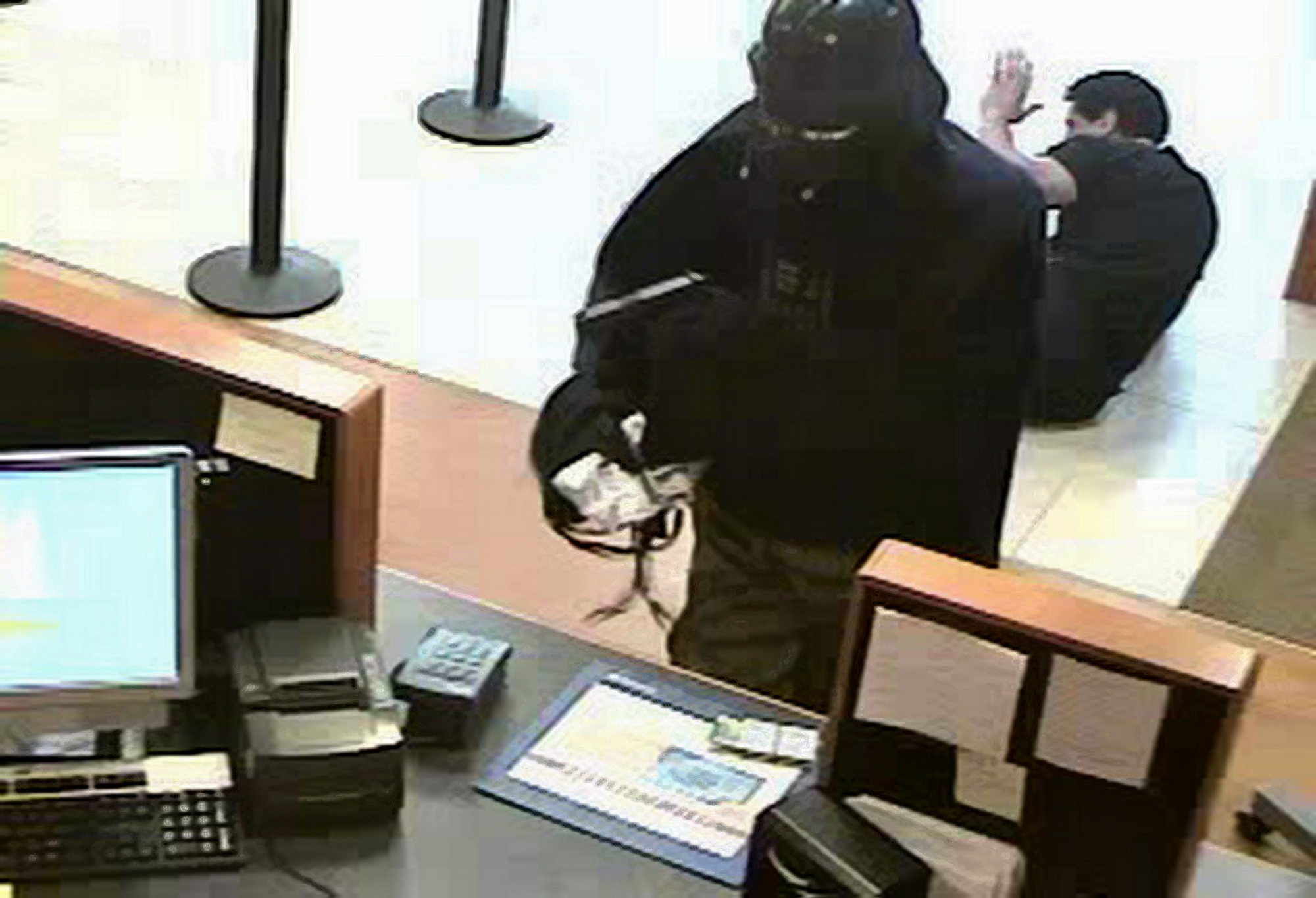 Darth Vader rånar bank. 