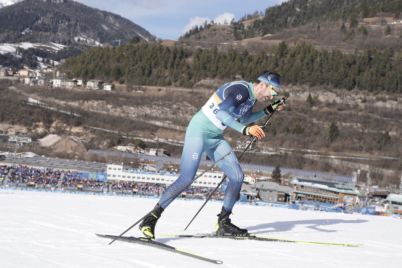 Landskapet utanför Val di Fiemme vid årets OS ser på sina håll snöfattigt ut.