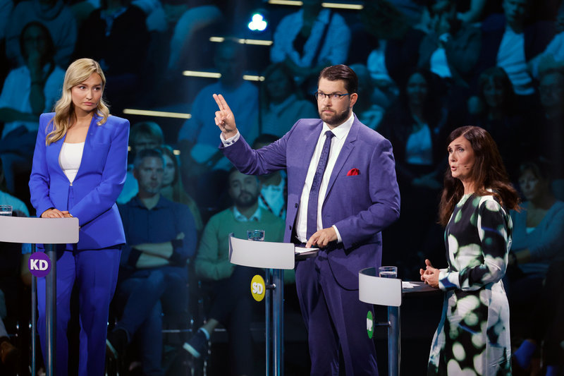 Kristdemokraternas partiledare Ebba Busch (KD), Sverigedemokraternas partiledare Jimmie Åkesson (SD) och Miljöpartiets språkrör Märta Stenevi (MP) under TV 4:s partiledardebatt före valet.
