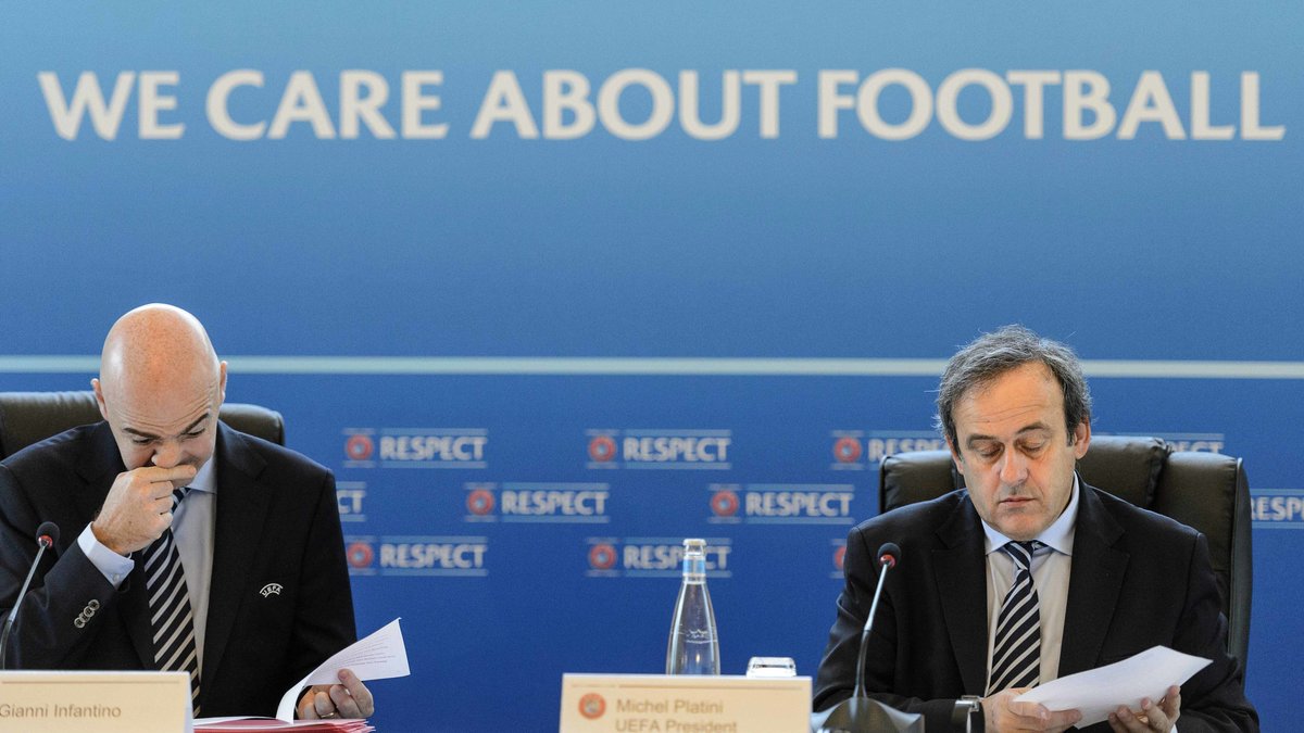Uefas generalsekreterare Gianni Infantino och presidenten Michel Platini.