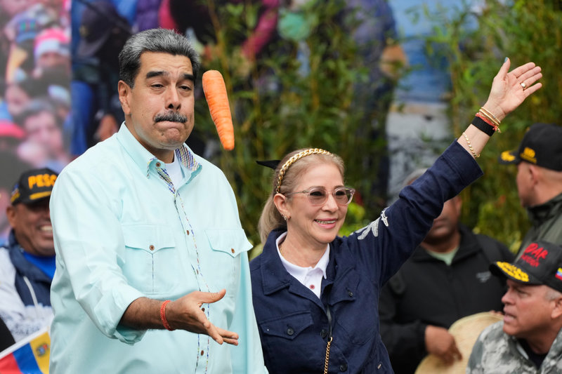 Nicolás Maduro och frun Cilia Floers. Foto: Ariana Cubillos/AP/TT