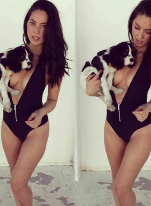 Olivia Munn myser med sin hund. Olivia Munn myser med sin hund.