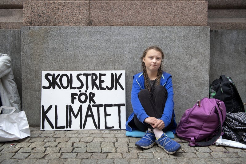 Greta Thunberg som 15-åring 2018, när hon inledde sin strejk. Foto: Jessica Gow/TT Greta Thunberg som 15-åring 2018, när hon inledde sin strejk. Foto: Jessica Gow/TT