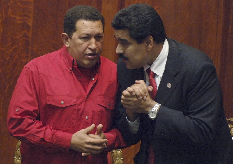 Venezuelas President Hugo Chavez tillsammans med Nicolás Maduro 2007. Foto: Matilde Campodonico/AP/TT