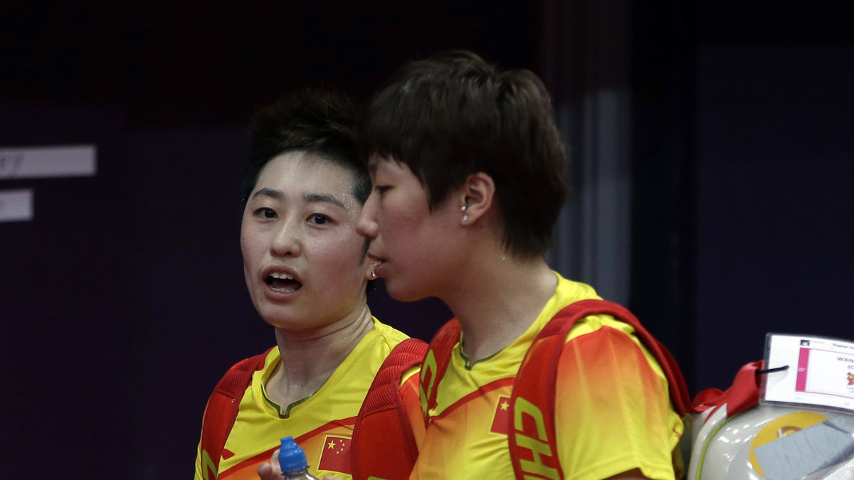 Tillsammans med sin dubbelpartner Wang Xiaoli diskades Yang och tre andra par i OS-badmintonen under gårdagen.