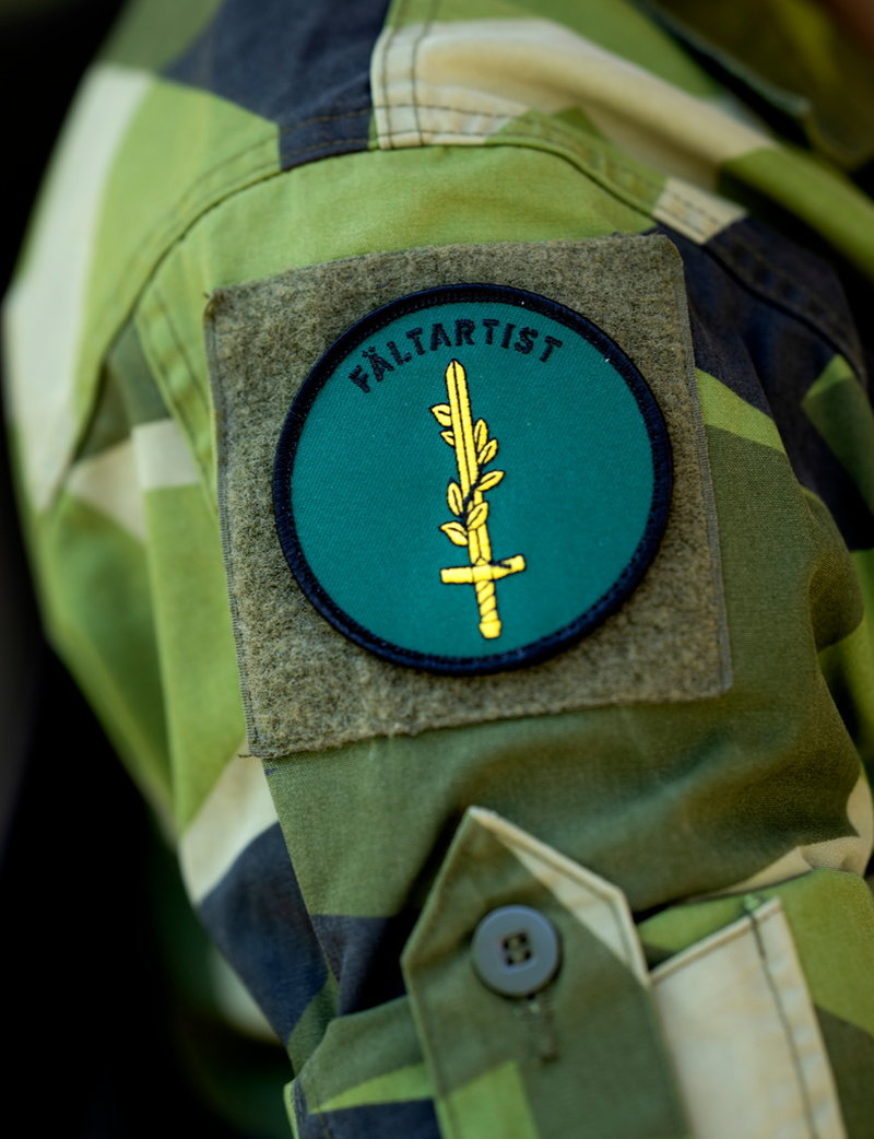Svärdet och liljan är fältartisternas symbol.
