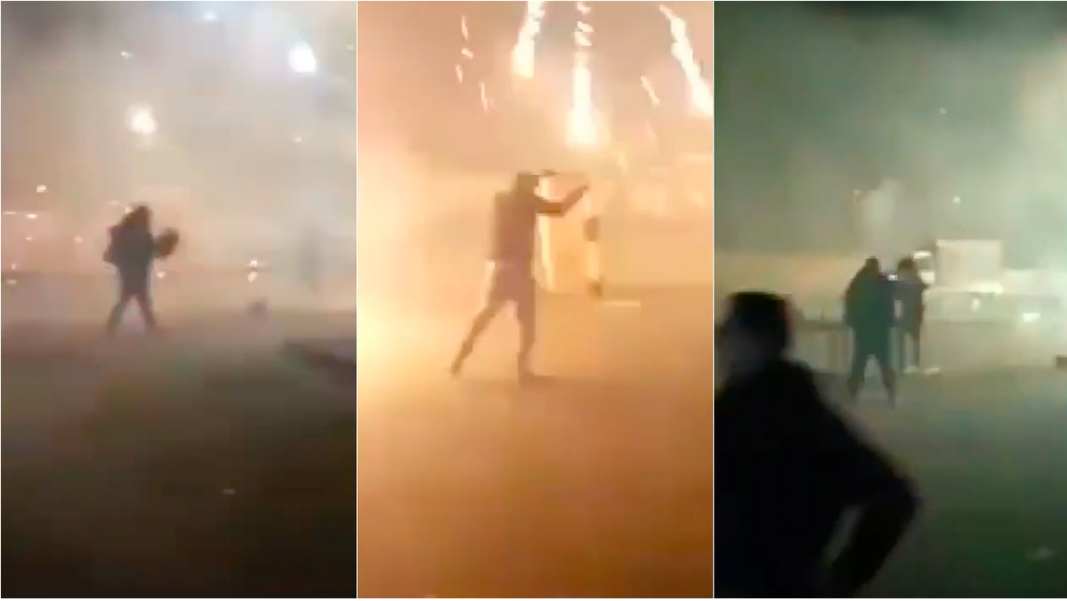 Bilder från video. Personer springer omkring medan raketer och smällare flyger till höger och vänster. 