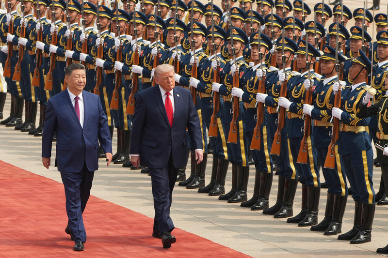 Kinas president Xi Jinping och USA:s president Donald Trump i Peking.