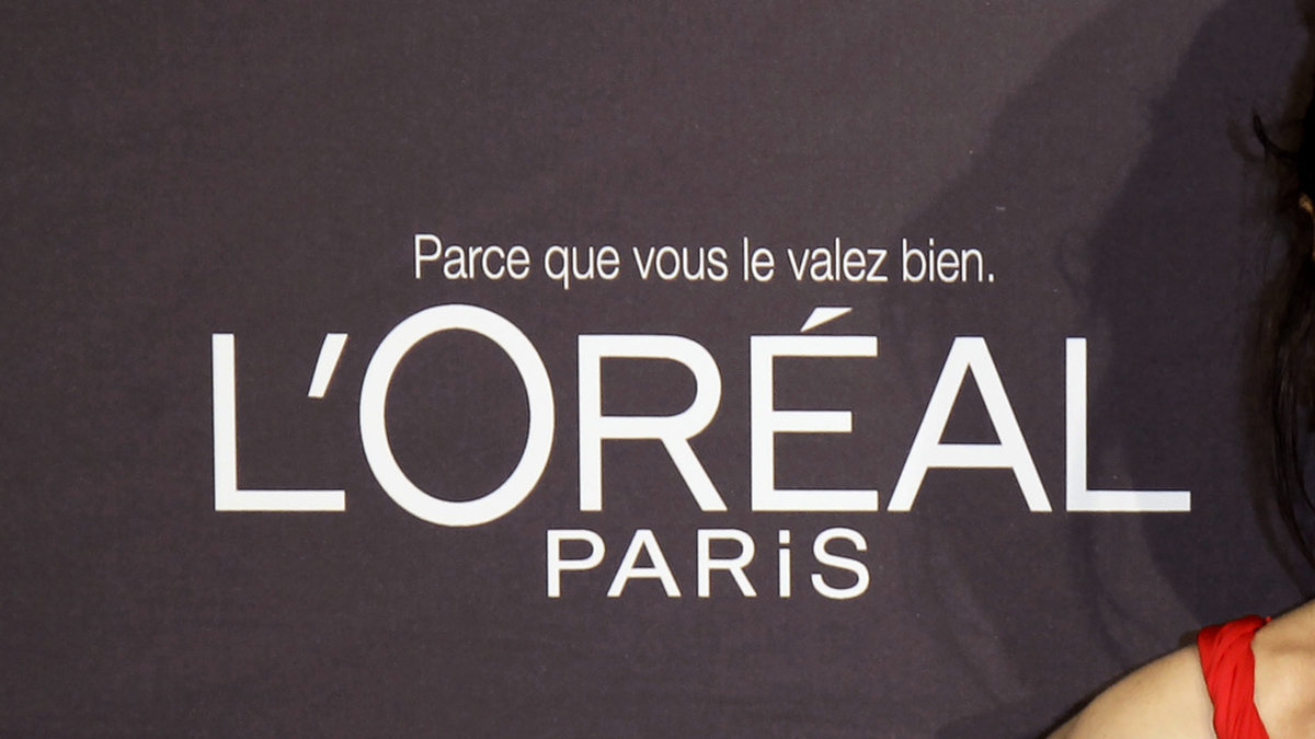 Rapportsmäll för L'Oréal. Arkivbild