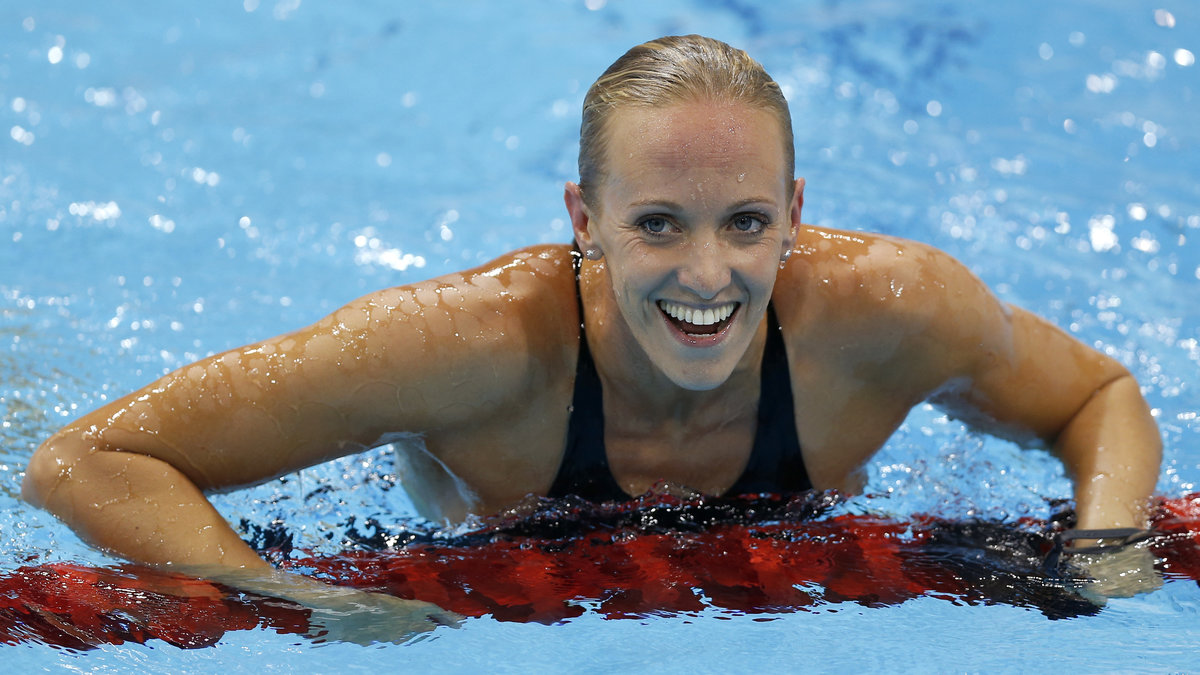 Dana Vollmer, USA, tog OS-guldet på 100 meter fjäril – och slog även Sarah Sjöströms världsrekord.