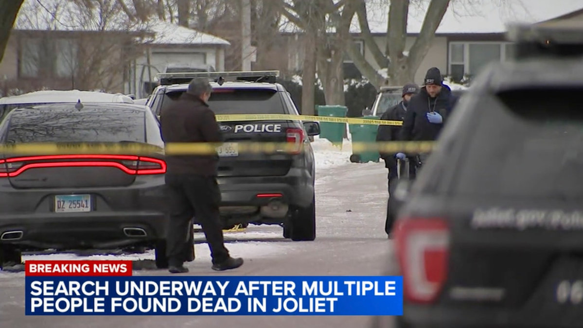 Bild från en tv-sändning från staden Joliet där polis arbetar vid en av brottsplatserna på måndagen.