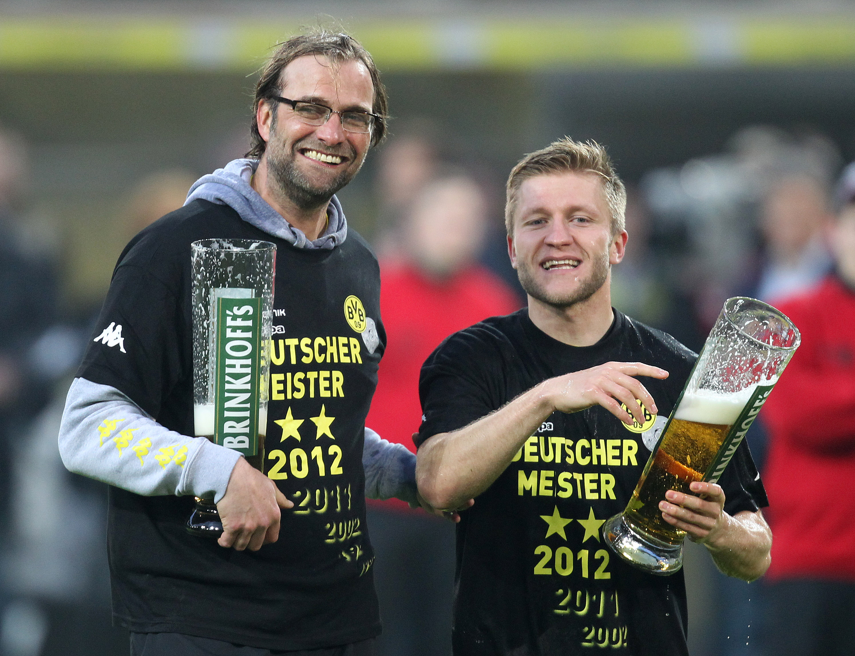 Tränaren Jürgen Klopp och polske mittfältaren Jakub Blaczykowski. Tränaren Jürgen Klopp och polske mittfältaren Jakub Blaczykowski.