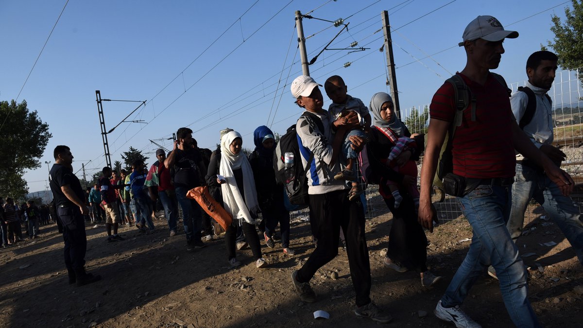 Flyktingar på gränsen mellan Grekland och Makedonien, september 2015. 