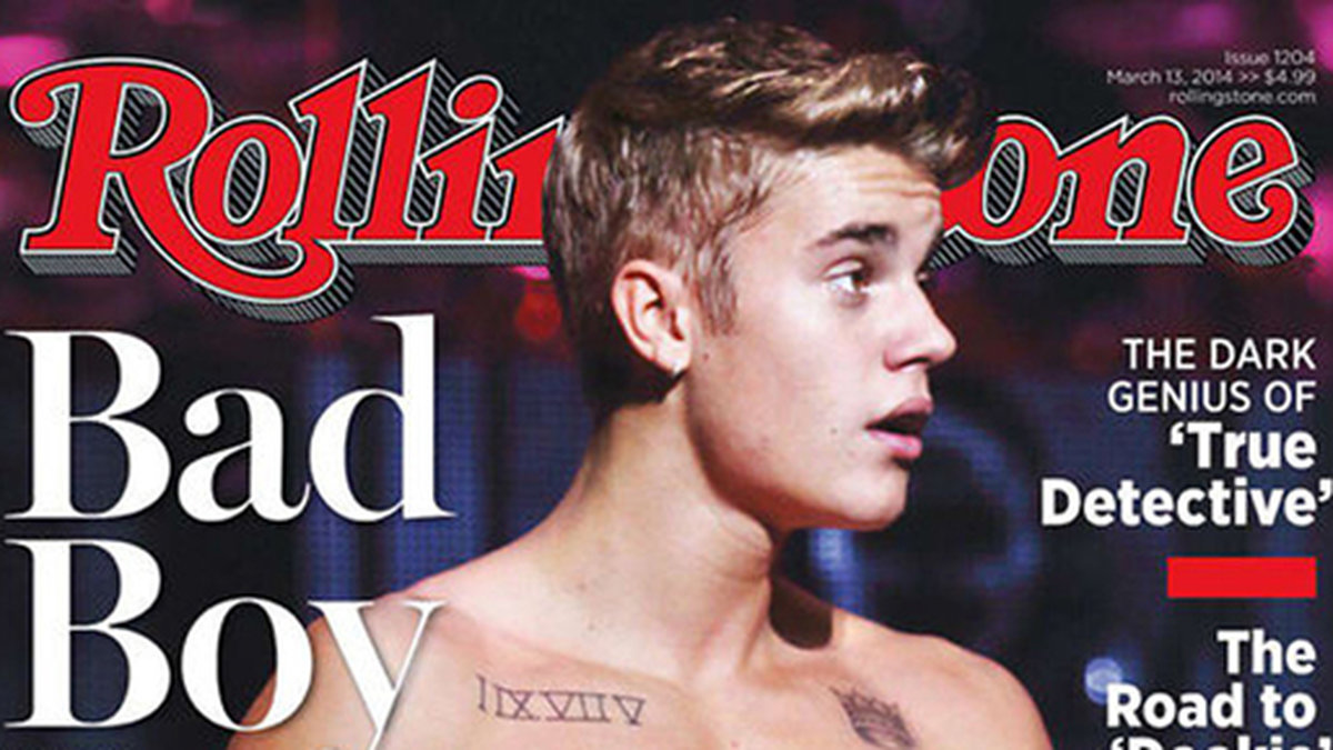 Justin Bieber visar musklerna på omslaget av Rolling Stone. 