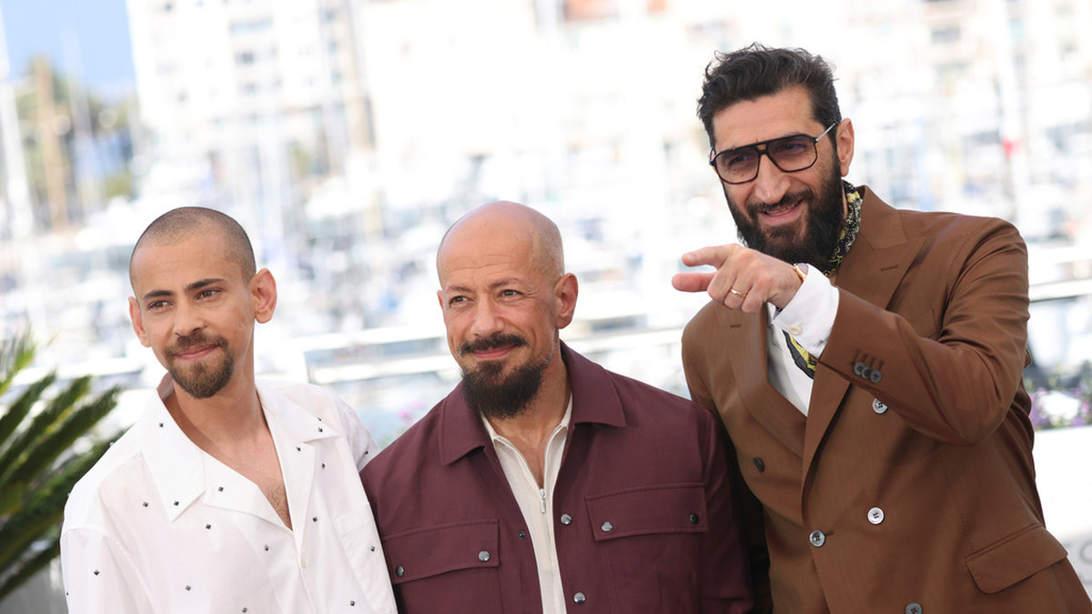 Skådespelaren Tawfeek Barhom, regissören Tarik Saleh och skådespelaren Fares Fares poserar i Cannes. Arkivbild.