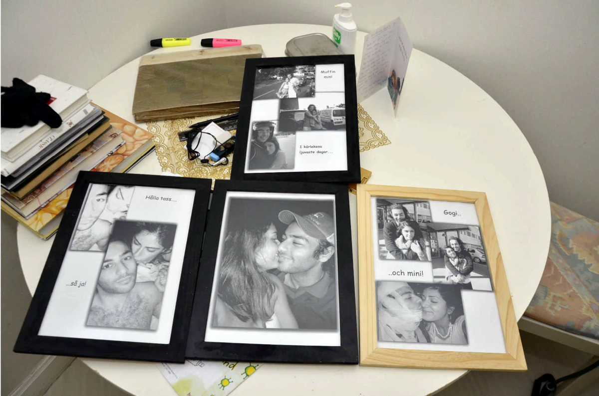 Här är de inramade fotografierna på "kärleksparet" Namdar Parastou och Elias Vecalius.