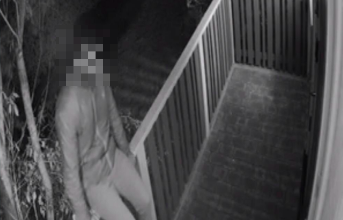Isabellas stalker sittandes på hennes veranda på Lidingö Isabellas stalker sittandes på hennes veranda på Lidingö